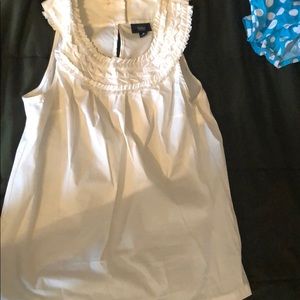 White sleeveless blouse
